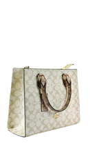 Coach Maggie - Tresolo-amr