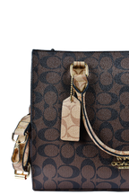 Coach Maggie - Tresolo-amr