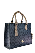 Coach Maggie - Tresolo-amr