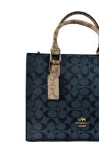 Coach Maggie - Tresolo-amr