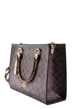 Coach Maggie - Tresolo-amr